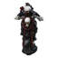 Figurine de motard squelette gothique sur des roses rouges
