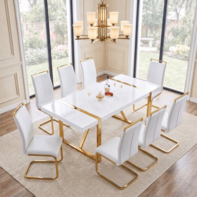 9-Piece Modern Glam Rectangular High-Gloss Dining Set with Faux Leather Cantilever Chairs