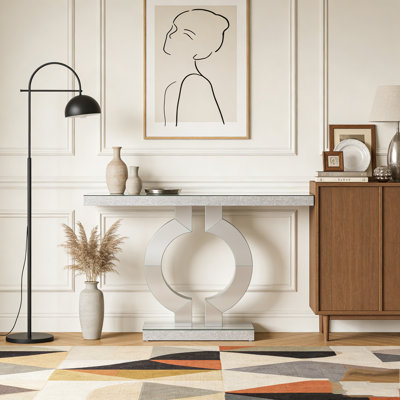 Console à miroir avec base en forme de O et miroir moderne