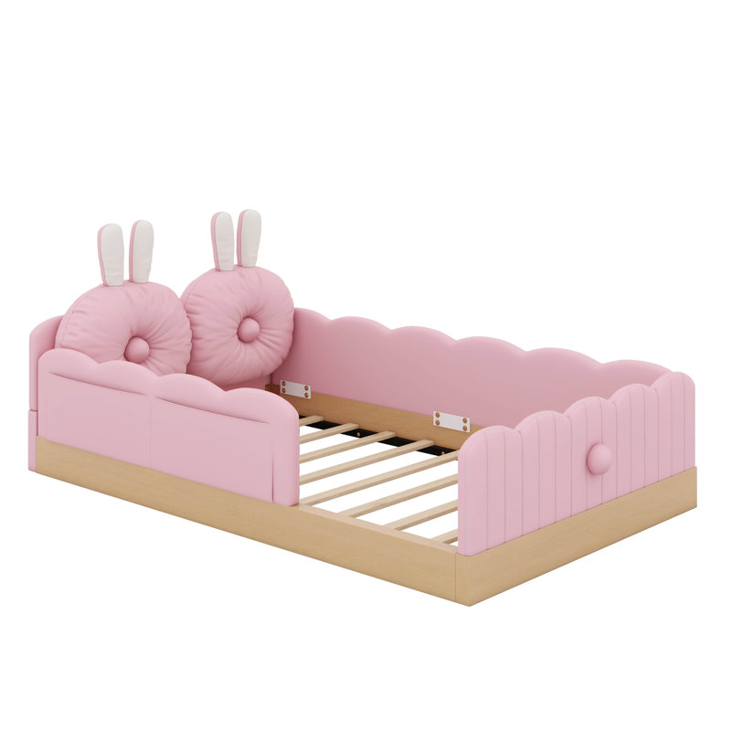 Joli lit au sol avec lattes de soutien, lit plateforme tapissier simple avec coussins et sacs de rangement, Rose