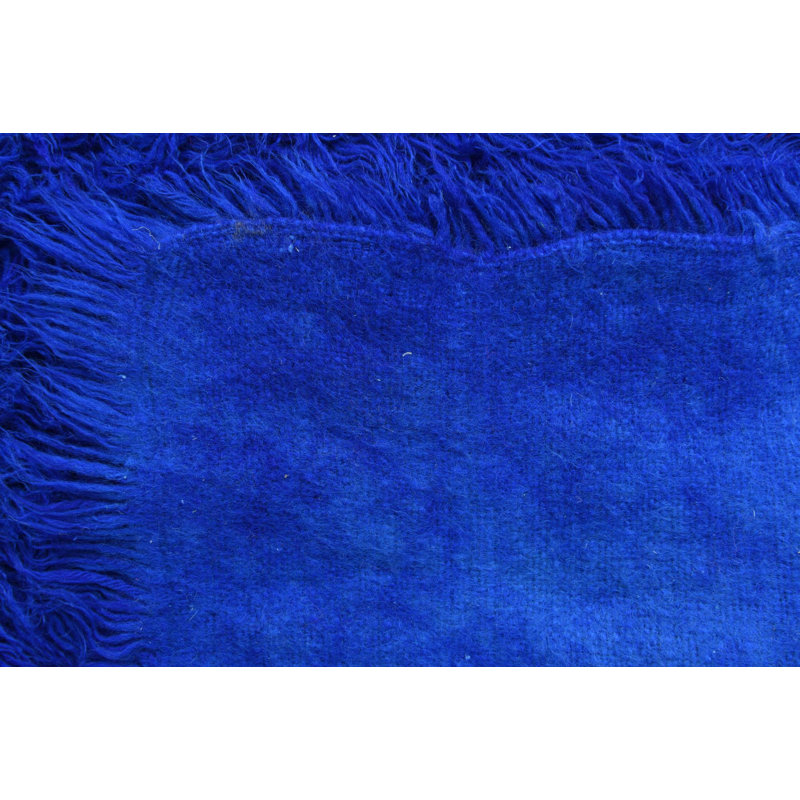 Tapis bleu Kalmanovitz