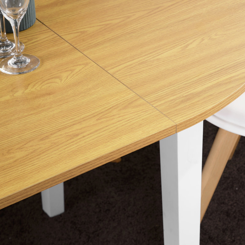 Driskell Extendable Round Solid Wood Base Dining Table