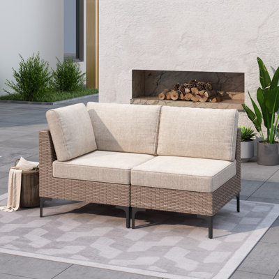 Jabahri 56'' Wide Outdoor Wicker Patio Sofa with Cushions