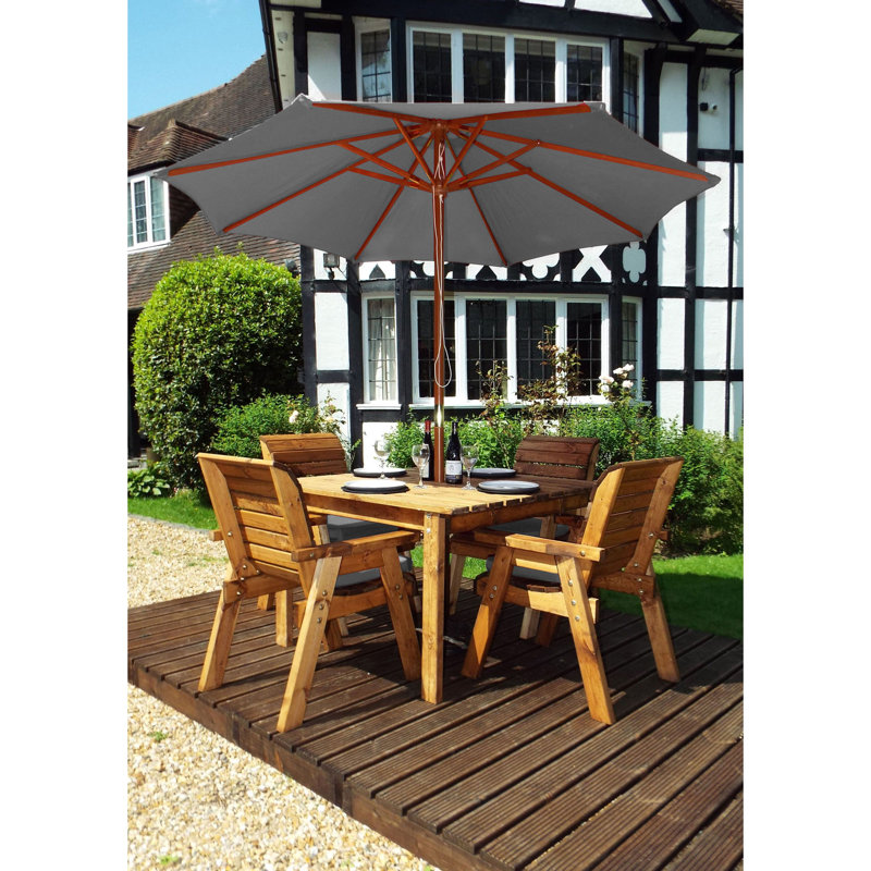 Felder 4 - Person Solid Wood Patio Dining Set Umbrella Hole Included Square Table with Cushions Included, Grey