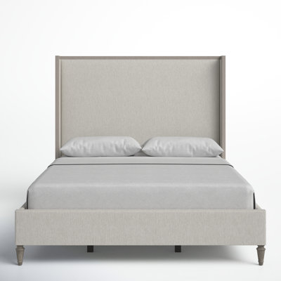 Dinora Upholstered Wingback Bed