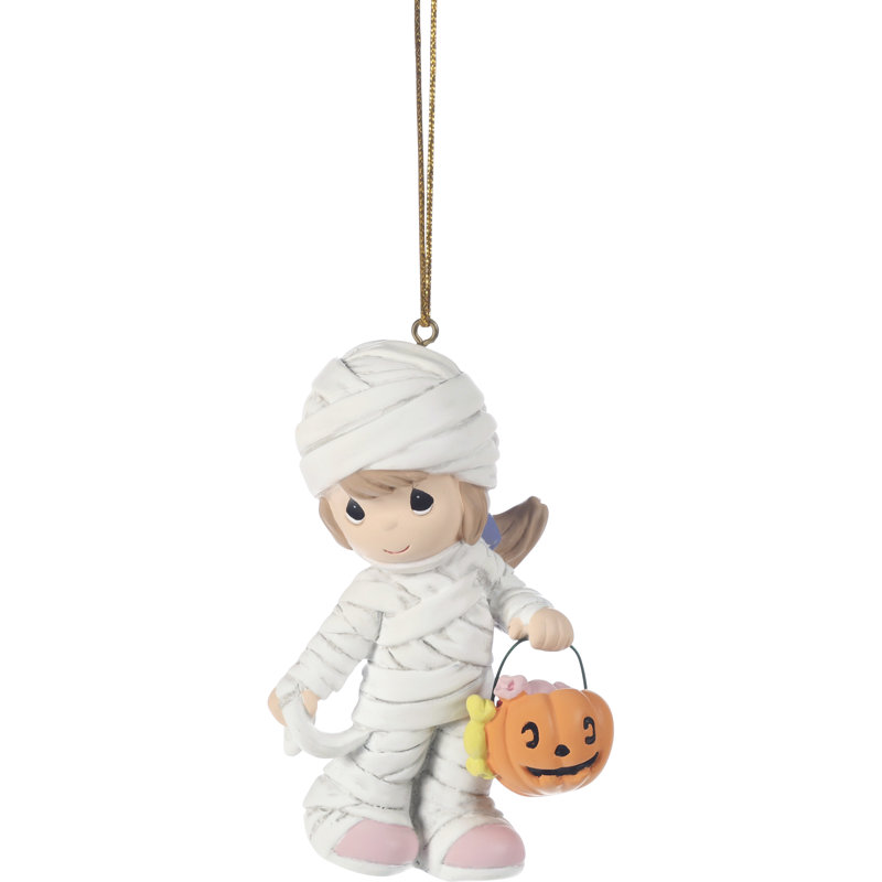 Precious Moments enveloppé dans un ornement d'Halloween