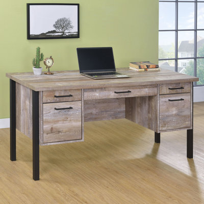 Bureau en chêne patiné à 4 tiroirs