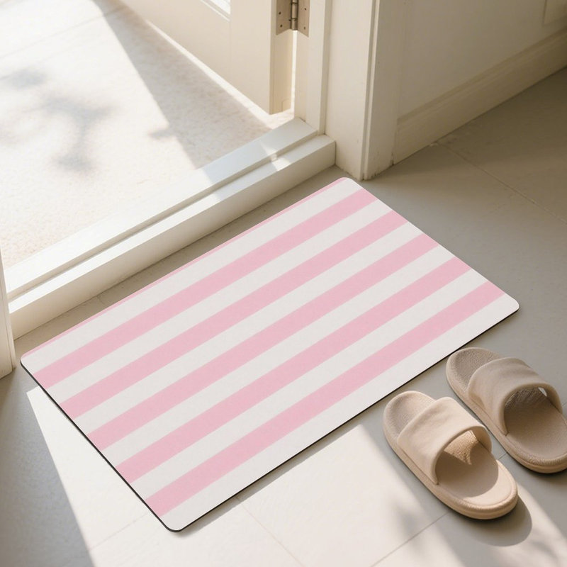 Paillasson 24L x 36W rose et blanc à rayures pour porche d'entrée