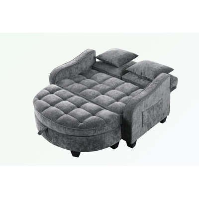 Double sofa chaise longue with irregular armrests and two small throw pillows by hanada