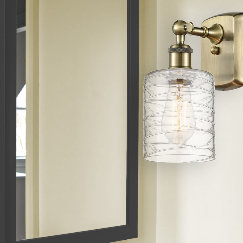 Whitmer Armed Sconce, Clear Deco Swirl, LED, Antique Brass