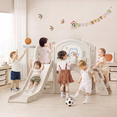 Ensemble de jeu 11 en 1 pour tout-petits avec glissade, aire de jeux intérieure avec tableau à dessin et ensemble de pinceaux, jeu de lancer d'anneaux, ballon de basketball, ballon de soccer et rangement pour les tout-petits de 1 à 3 ans.