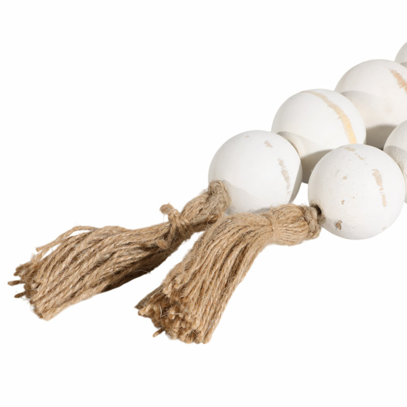 Guirlande de perles en bois de manguier avec pampille en jute, Blanc