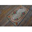 Tapis américain antique à motif floral incrusté ovale