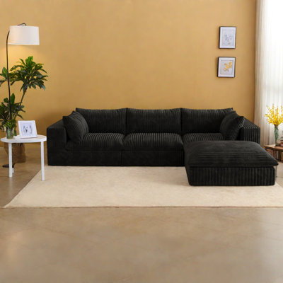 Canapé luxueux en velours côtelé, assise profonde, noir, idéal pour les espaces de vie