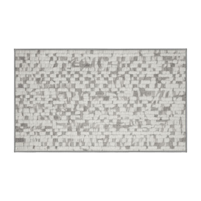 Tapis gris lavable à la machine