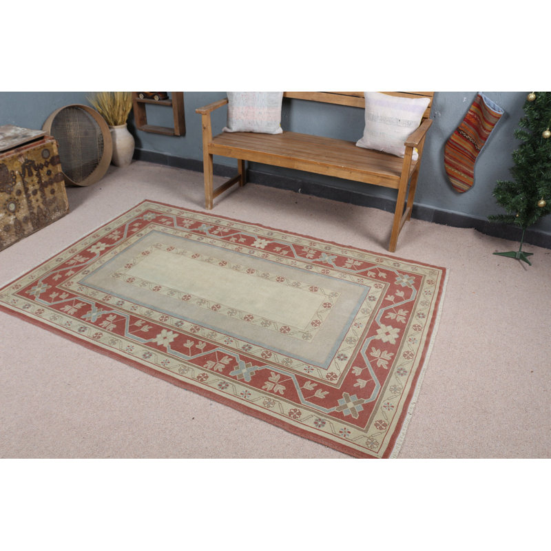 Tapis en laine tissé à la main dans des tons pastel doux avec motif géométrique turc et floral traditionnel