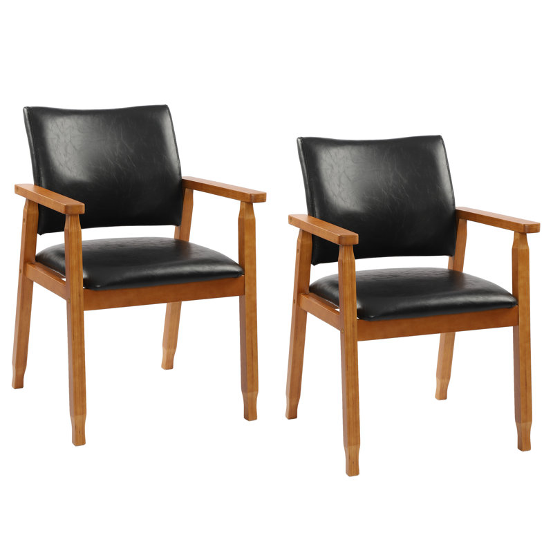 Ensemble de 2 chaises de salle à manger Artell de 47 cm (18,5 po) de hauteur, revêtues de similicuir et dotées d'une structure en bois massif.
