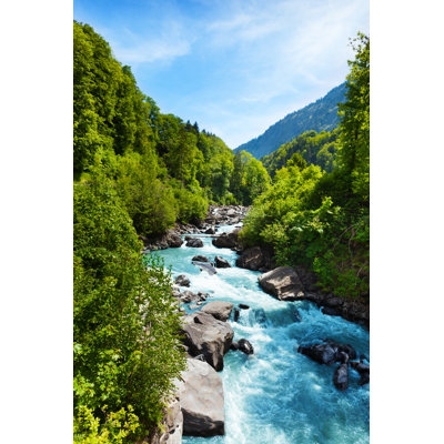 Vivid Swiss Landscape With Pure River Stream by SerrNovik - Wrapped Canvas Print