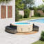 Contour de spa vidaXL en poly rotin gris et bois d'acacia massif-130561361