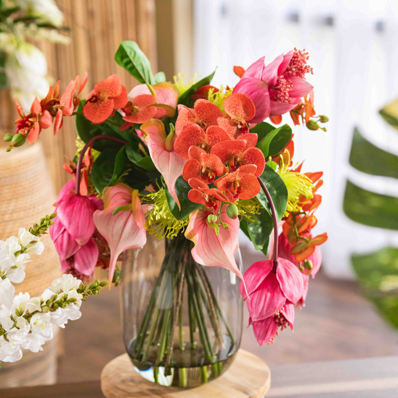 Isle of Magnifica Orchid Floral Arrangements in Vase