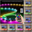 Meuble télé moderne à DEL de 82,6 pouces avec sélection de couleurs RVB complète, 31 modes de changement de lumière et armoires de rangement spacieuses