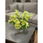 Orchids And Leaves In A Glass Vase