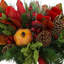 Holiday Candleholder Arrangement with Evergreens and Pinecones