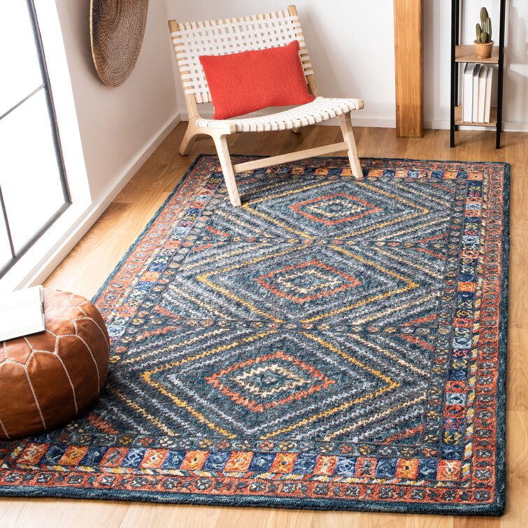 https://assets.wfcdn.com/im/88297113/resize-h755-w755%5Ecompr-r85/1128/112815316/Guillermo+Handmade+Wool+Rust+%2F+Green+Rug.jpg