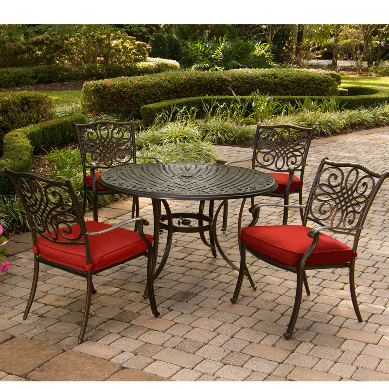 Rackers 4 - Person Patio Dining Set with Round Table