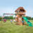 Backyard Discovery Highlander Cedar Wood Swing Set with Wave Slide, Three-Story Clubhouse, Rock Wall, and Picnic Table