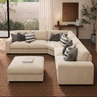 Canapé d'angle moderne en forme de L avec pouf de rangement
