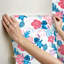 Papier peint à motif de fleurs tropicales Disney Stitch-109237120