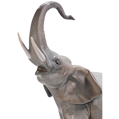 Elephants Walking Figurine