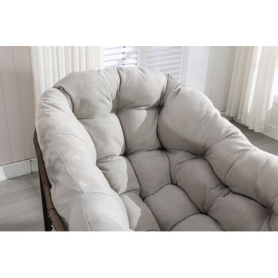 Chaise berçante d'extérieur en rotin