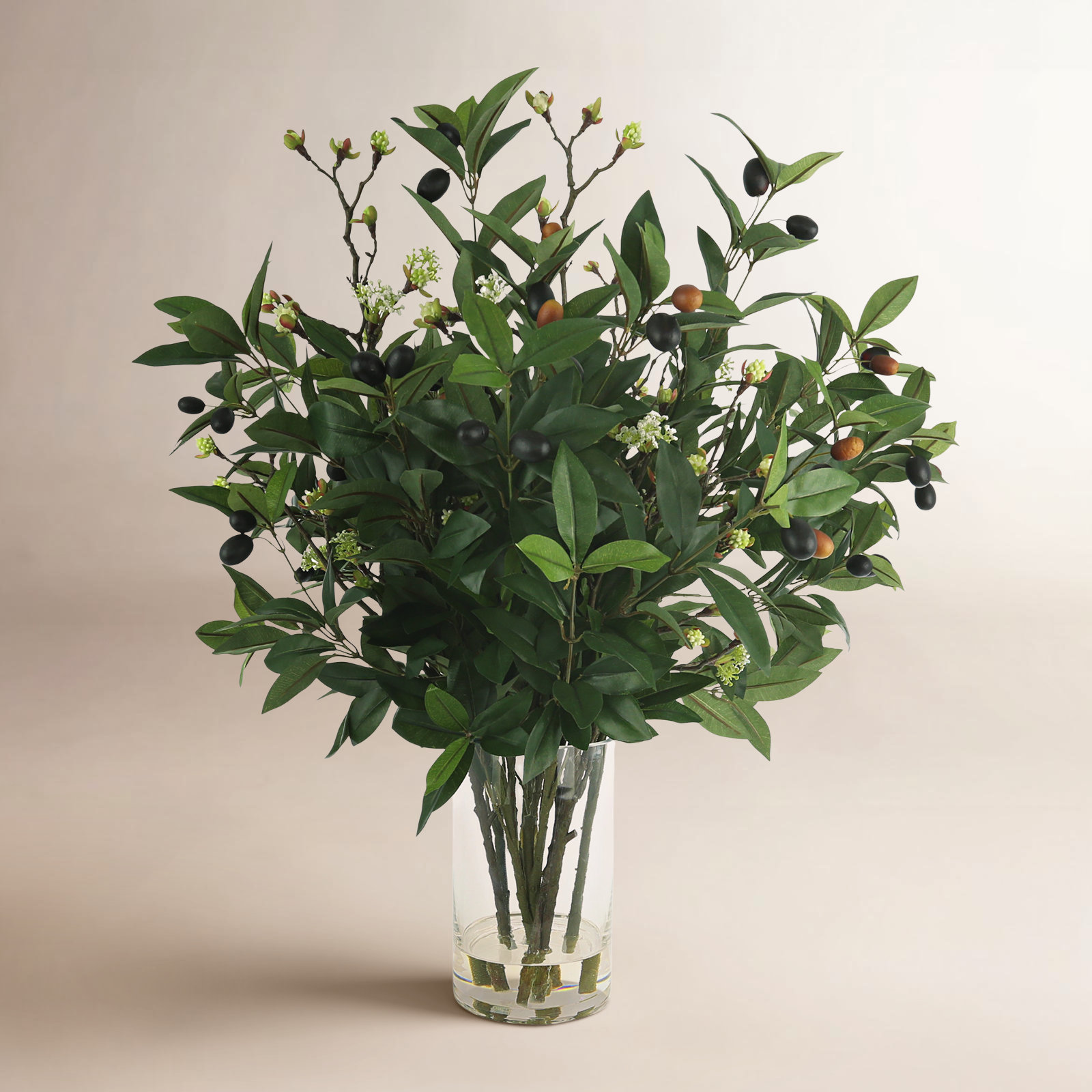 Olive Branches mixed with Blossoms Arranged in Glass Vase