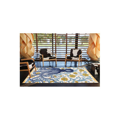 Tapis bleu lavable à motifs tissés