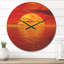Horloge murale soleil tombant sur l'océan-63617894