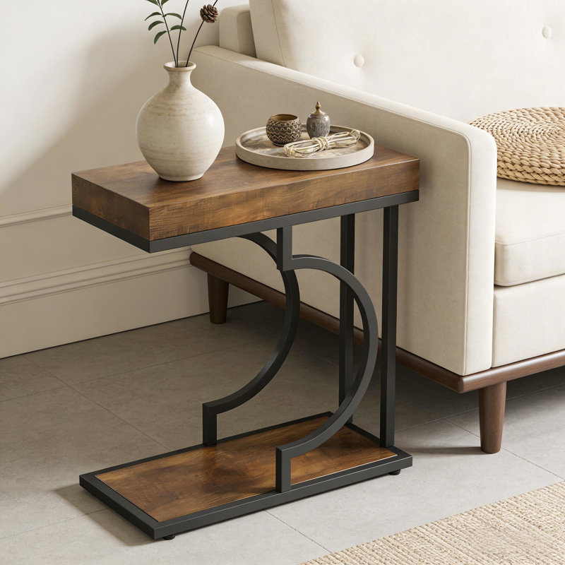 Table de chevet fonctionnelle pour petits espaces, fini noir et brun, facile à assembler. Style élégant et contemporain, structure semi-circulaire moderne, légère et mobile.