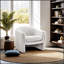 Fauteuil d'appoint compact contemporain en forme de U, recouvert de tissu bouclé, idéal pour les salons modernes et offrant une assise confortable et élégante.-668720083