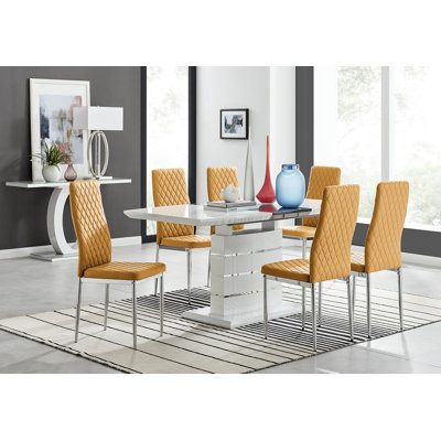 Ensemble de salle à manger extensible Everson 6 places avec chaises rembourrées en similicuir