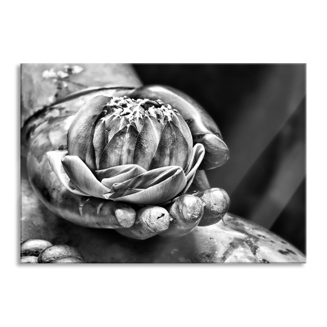 Glasbild Lotus in der Hand des Buddha