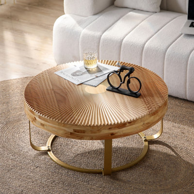Table basse moderne et ronde à motif de sculpture sur bois avec pieds en métal pour le salon