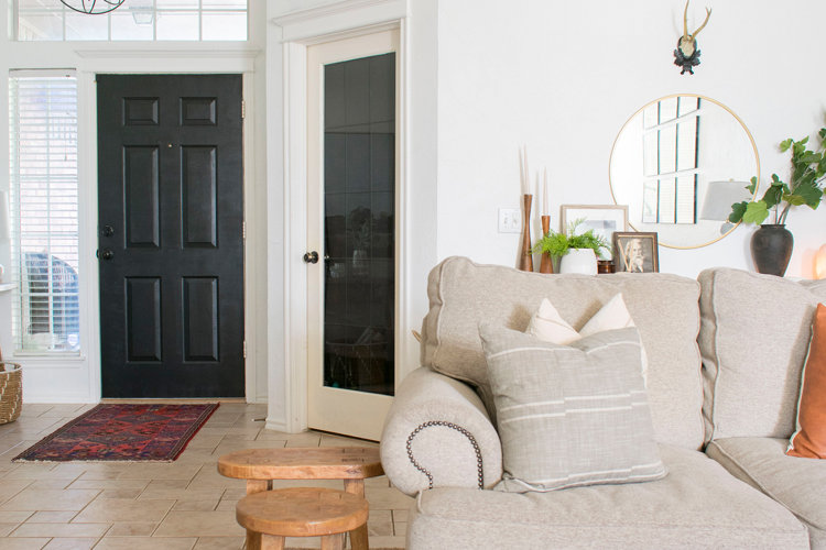living room with neutral sofa