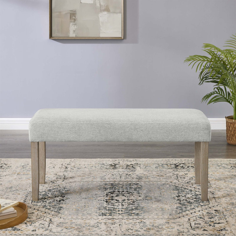 Banc de salle à manger Tabitha en chêne clair avec siège rembourré confortable, idéal pour les réunions de famille confortables et les réceptions élégantes.