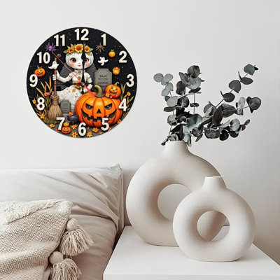 Halloween clock with mummy and pumpkins