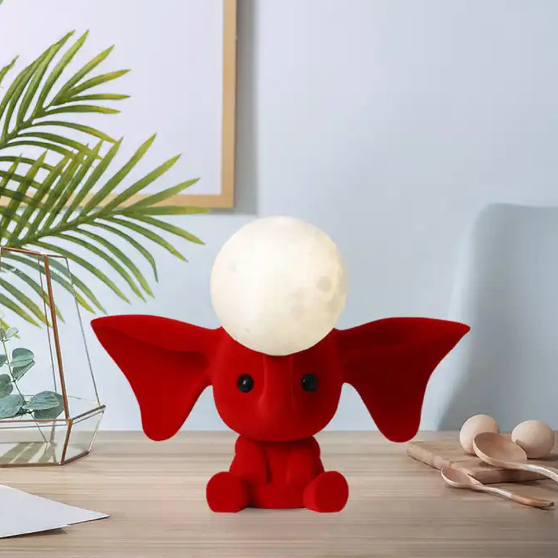 Caricature d'une lampe de table en résine, Rouge
