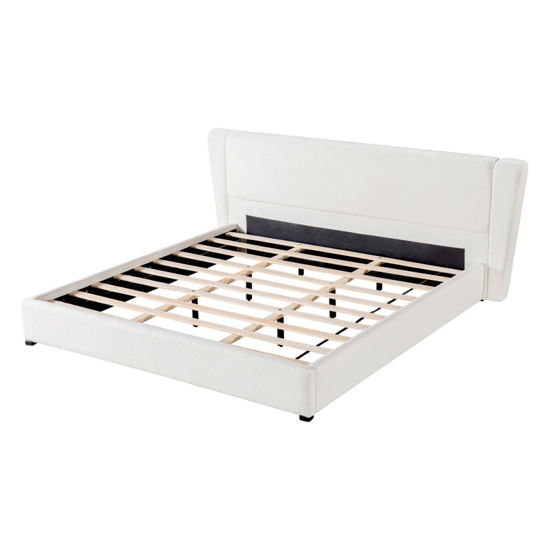 Lit plateforme Quilla moderne à oreilles capitonnées avec tissu bouclé, lattes en bois massif et tête de lit rembourrée - Chambre à coucher à l'ambiance feutrée
