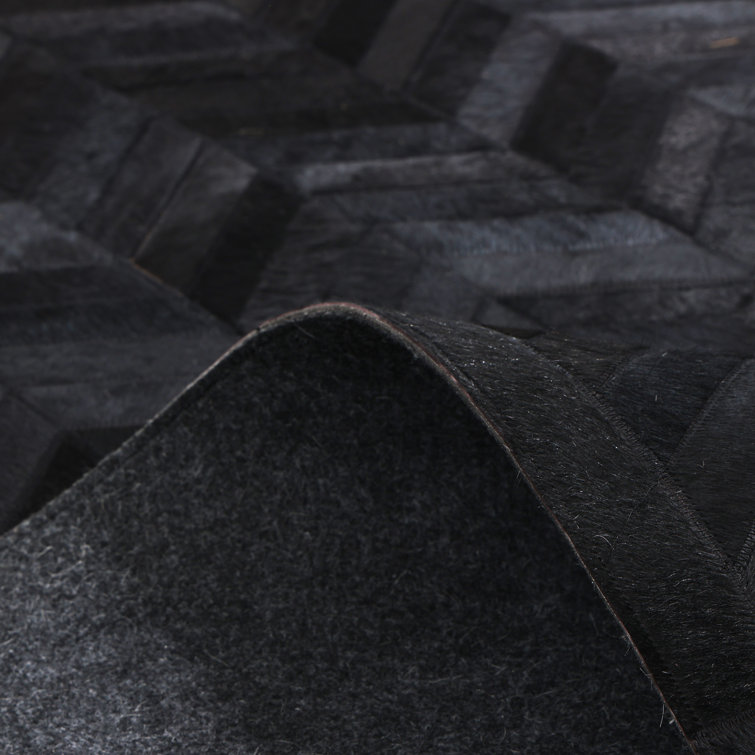 Meir Leather Chevron Area Rug in Black