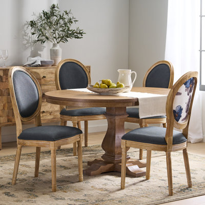 4 - Person Extendable Pedestal Dining Set