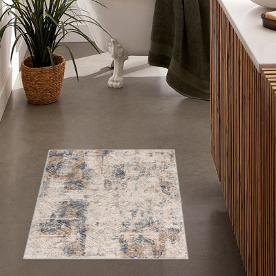Tapis beige à motif abstrait Mcevoy